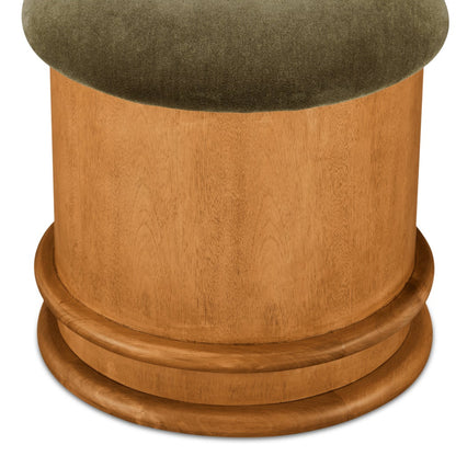 Wooden pedestal with green cushion top on a white background